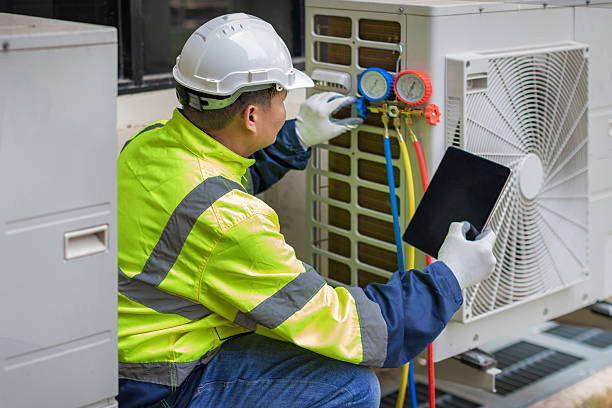 Professional Air Conditioning Repair technician working in Highland, IN